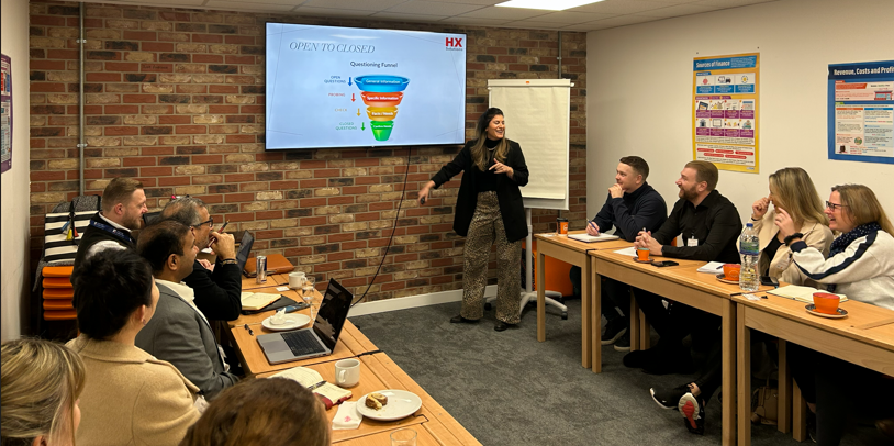 Image of the sales training course with people lauging